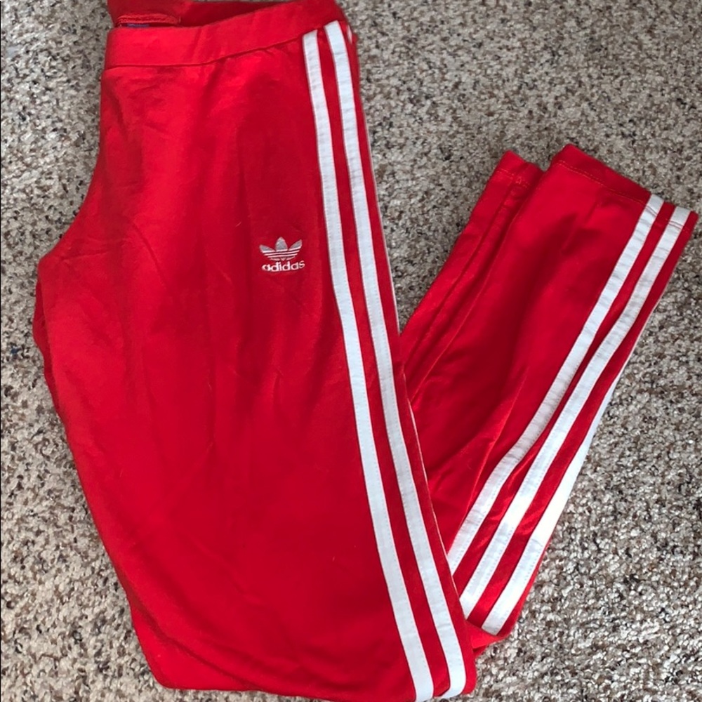 Adidas red leggings to ankle .